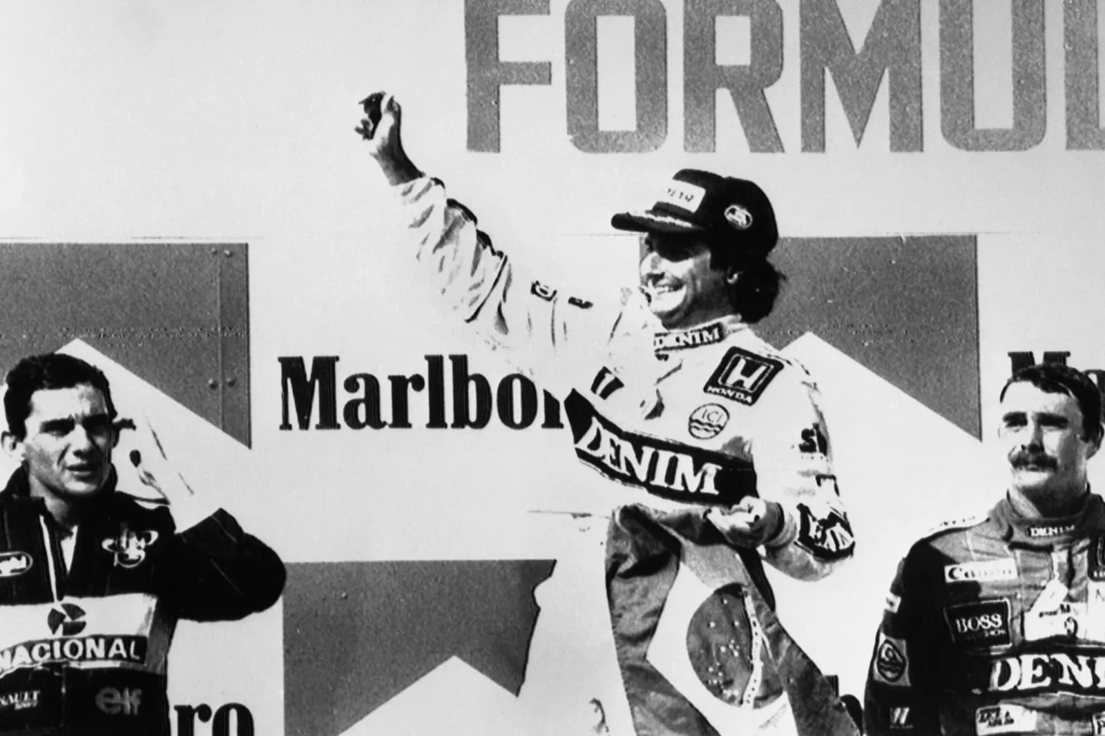 Die Siegerehrung 1986: Piquet feiert, Ayrton Senna, (links) und Nigel Mansell hatten das Nachsehen