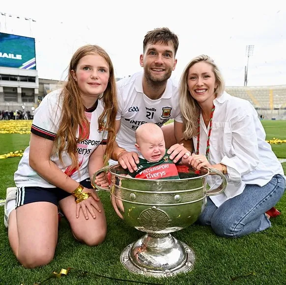 Dublin , Ireland - 26 July 2026; Aidan O'Shea of Mayo with his sister Méadbh, left, his wife Kristin and his daughter Romee after the GAA Football All-Ireland Senior Championship final match betw ...